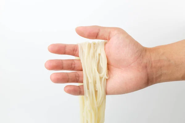 Kore eriştesi. Kore eriştesi. Çiğnenmiş ve sıkı bir doku.