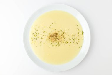 Yumuşak bir dokusu olan sıvı yiyecekler. Kremalı yemek. Rahatça yiyebileceğiniz yemeğin yerine yenisini koyun.