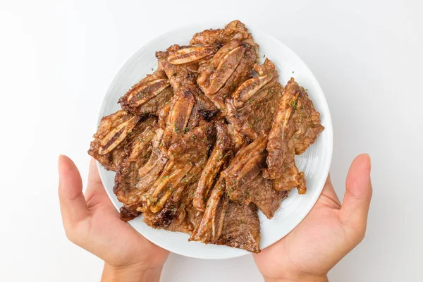 Kore barbekü kültürü. Baharatlı ızgara Kore bifteği. Kore bifteği.