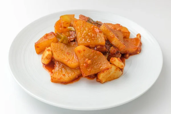 Radish and vegetables simmered in seasoning. Korean food culture. Korean vegetarian cuisine