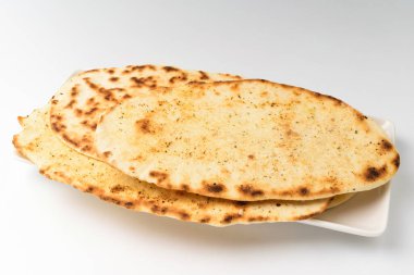 Hindistan 'da ekmek ana yemek olarak yenir. Hint yemek kültürü. Çiğnenmiş ve yumuşak ekmek