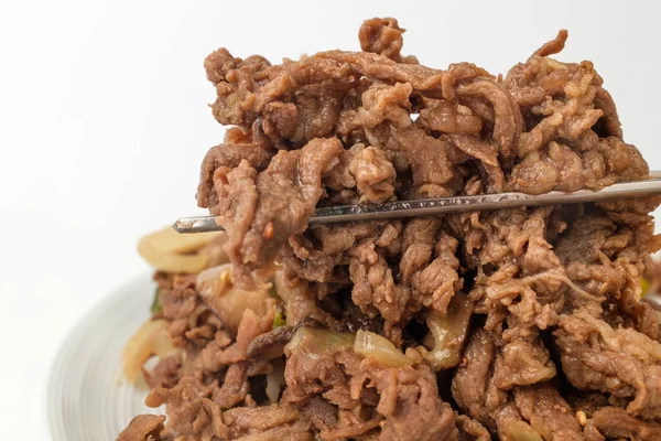 Baharatlı domuz eti. Kore mutfağı kültürü. Sebzeli et yemeği