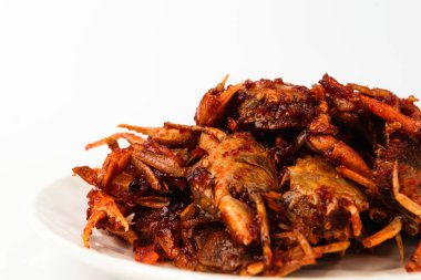 Küçük yengeç yemekleri. Karışık deniz ürünleri çeşnisi. Çıtır çıtır bir dokuda yemek pişirmek.