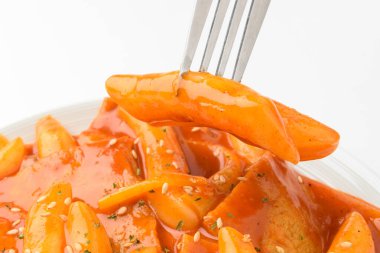 Kore yemek kültürü. Baharatlı Kore yemeği. Baharatlı pirinç keki.