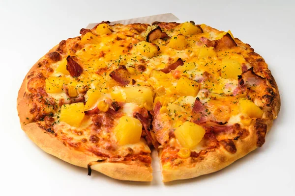 Pizza with Pineapple. Food with tomato sauce and cheese. A dish made from flour