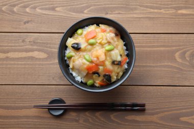 rice bowl Chinese style vegetable meat seafood with chopsticks isolated on table