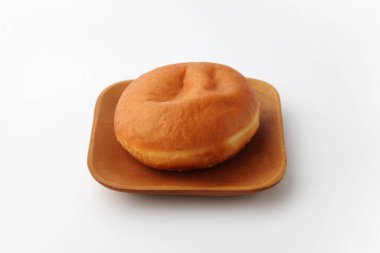 Malasada Portekiz Hawai çöreği beyaz arka planda.