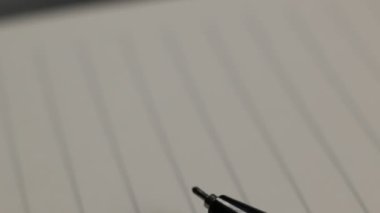 Close up of a Pen on notebook