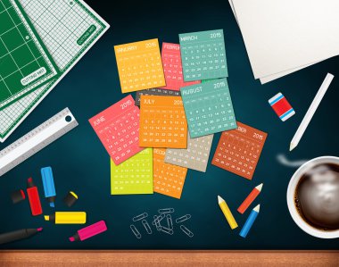 Workplace with calendar and a cup coffee on chalkboard close-up clipart