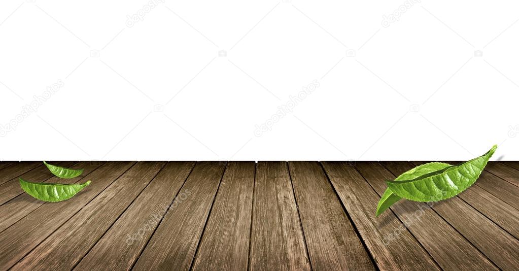Green tea leaves on Wooden floor background