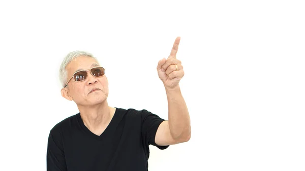 Asian senior man pointing on white isolate background — Stock Photo, Image