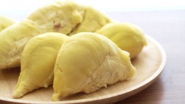 Altın durian meyve kokulu bir ahşap doku arka plan üzerinde Kralı
