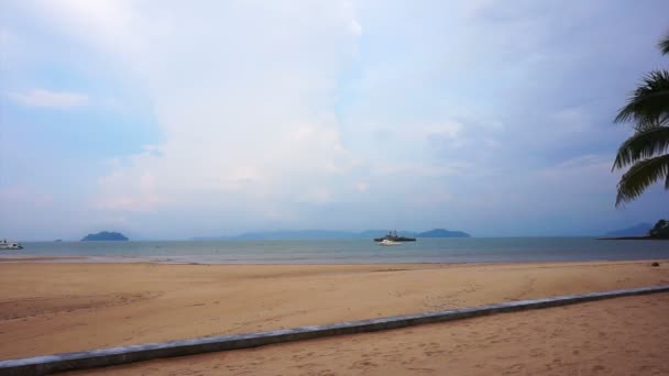 Low tide of the beach in the afternoon. Seashore with battleship far away — Stock Video