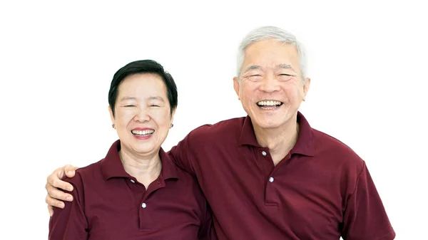 Feliz asiático sênior casal segurando as mãos no branco isolado fundo — Fotografia de Stock