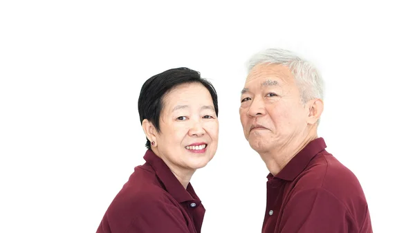 Feliz asiático sênior casal segurando as mãos no branco isolado fundo — Fotografia de Stock