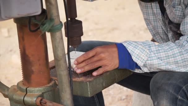 Worker using hand metal drilling machine. Drill hole in aluminium metal. No safety — Stock Video