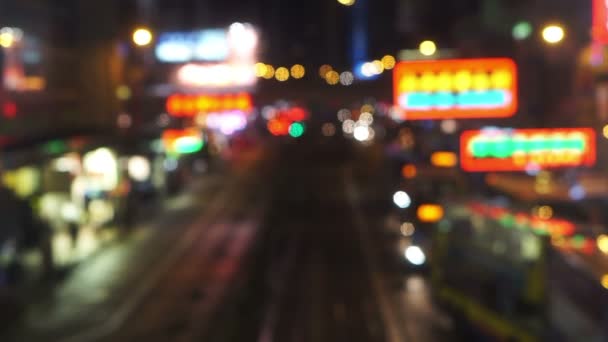 Hong Kong night street blurred video of city signs and transportations — Stock Video