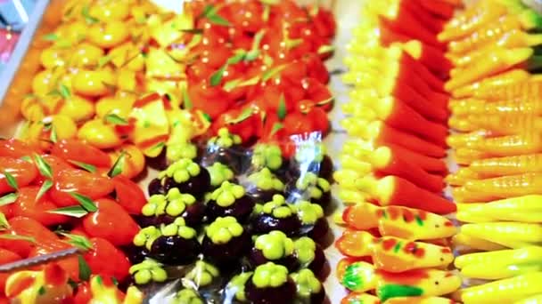 Thai dessert Kano look choup, deletable imitation tropical fruits. Green pea paste stuffed inside jelly skin with colourful paint — Stock Video