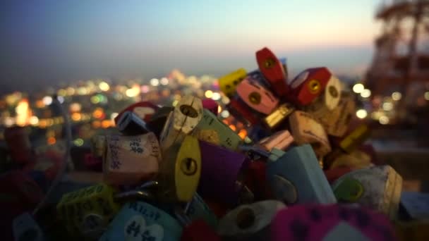 SEOUL,SOUTH KOREA - July 2016:  N Seoul Tower lock of love with romantic night view from hill deck — Stock Video