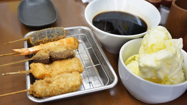 Kushikatsu, Japanese dish of seasoned, skewered and deep fried m — Stock Photo, Image