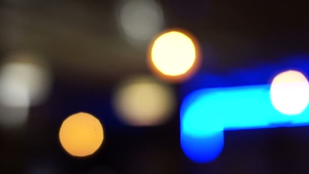 Desenfoque brillante luz de fondo bokeh en la oscuridad — Vídeos de Stock