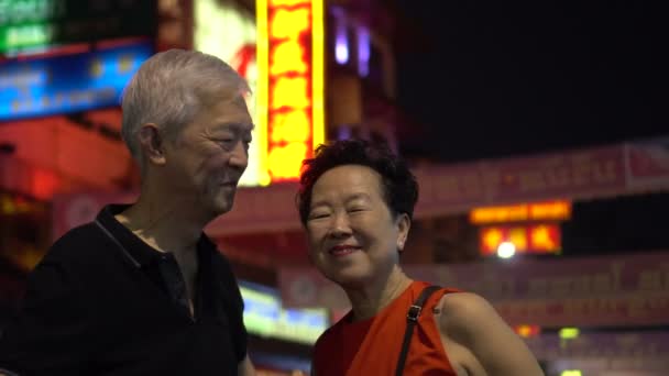 Asian Senior Couple Happy Traveling Bangkok China Town Night Colorful — Stock Video