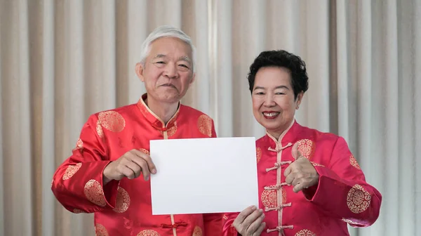 Senior Elder Couple Chinese New Year Costume Hold Sign Copy — Stock Photo, Image