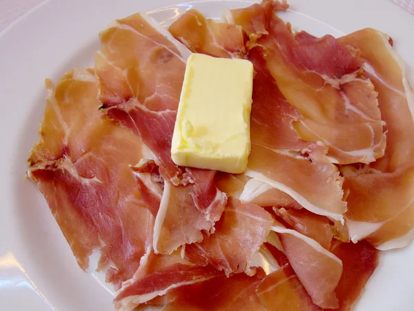 Parma raw ham with butter — Stock Photo, Image
