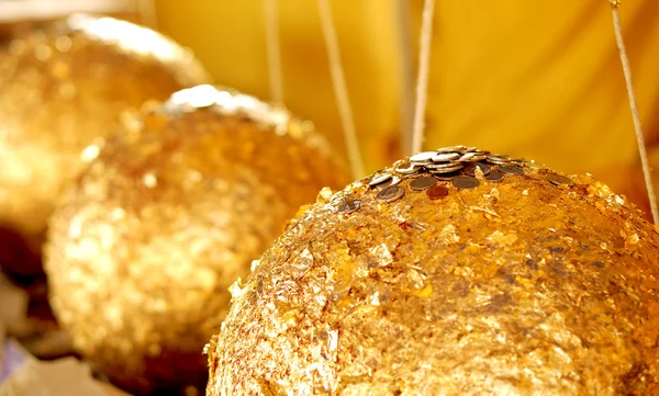 Golden ball from gold leaves patching — Stock Photo, Image