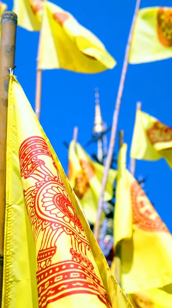 Buddhist flag with pagoda top — Stock Photo, Image