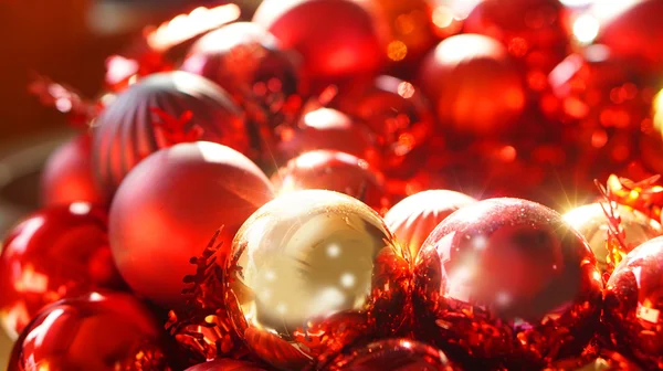 Red and gold christmas ornaments background — Stock Photo, Image