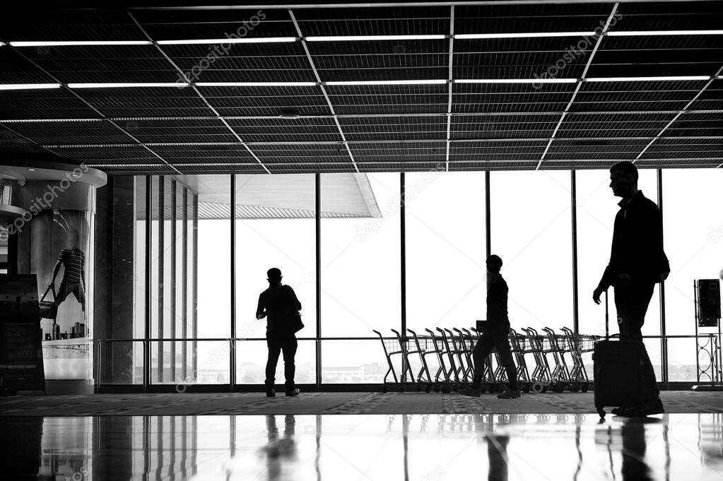 people silhouettes at airport