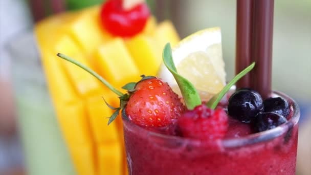 Berries smoothies and mango tropical drink