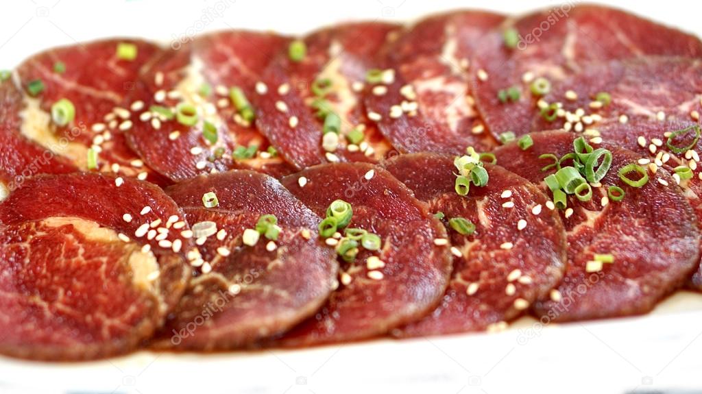 Raw beef slices for barbecue or yakiniku