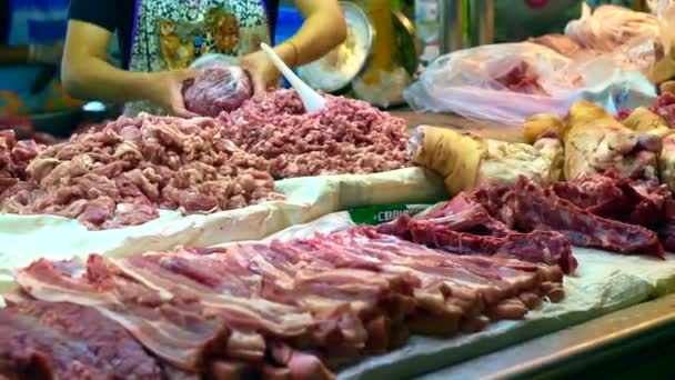 Fresh red pork meat selling in local Asian market, unhygienic food — Stock Video