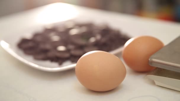 Eggs and chocolate chips — Stock Video