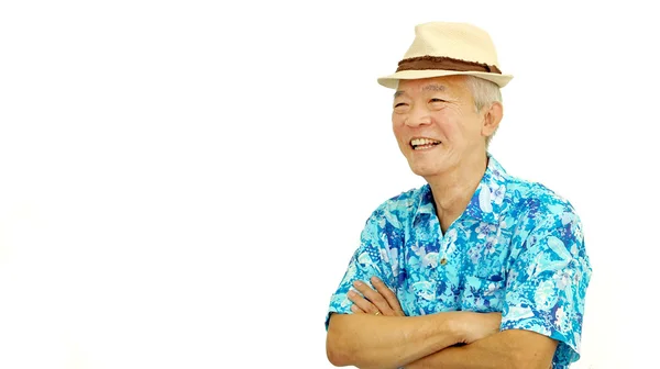 Asiatiska senior kille på blue hawaii skjorta bär hatt redo för holi — Stockfoto