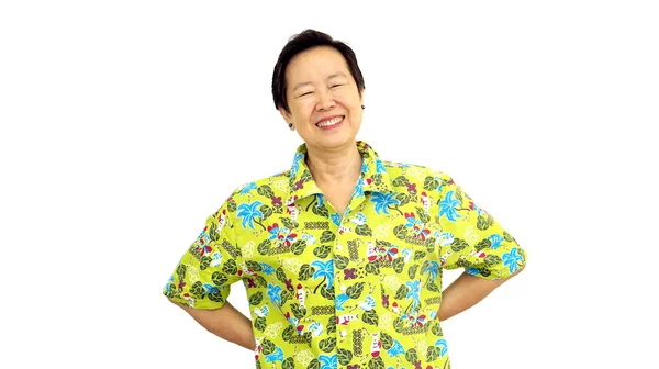 Asian senior woman smile on green hawaii shirt white isolate bac — Stock Photo, Image