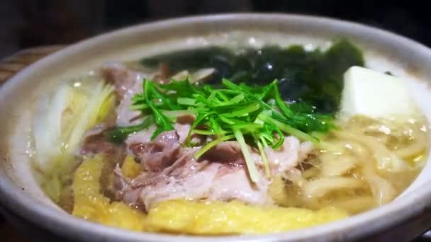 Video of Meat hot pot, japanese food, nabe sukiyaki style — Stock Footage Video of Meat hot pot, japanese food, nabe sukiyaki style Stock Video
