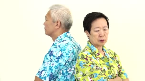 Video Asian senior couple fighting, pouting and get upset to each other on holiday trip — Stock Video