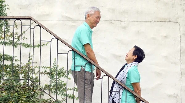 Asian senior couple travel for anniversary trip