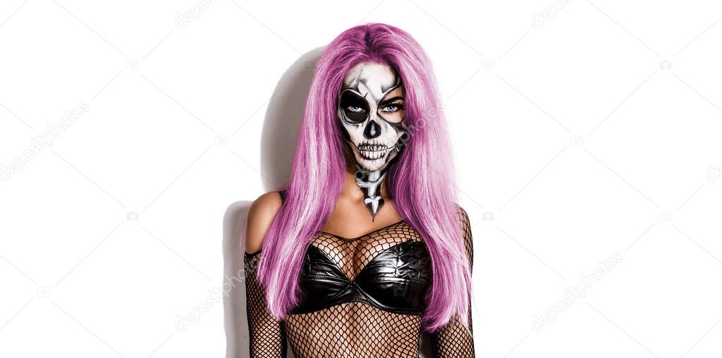 Female in Halloween silence. Sexy woman in top hat and skull make up. Halloween makeup.