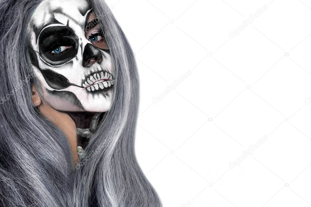 Female in Halloween silence. Sexy woman in top hat and skull make up. Halloween makeup.