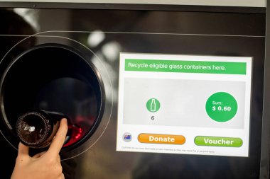 Sydney, Australia 2020-01-18. Return and Earn public return point for recycling. Reverse Vending Machine for refund and recycling of glass bottles. Recycling clipart