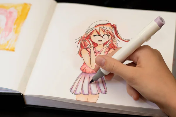 Hand drawing a cute girl anime style sketch with alcohol based sketch drawing markers.