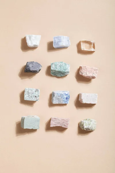 many crystal minerals on beige background. magic rock for crystal ritual, witchcraft, spiritual practice and meditation