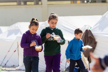 Refugees  living in tents in the center relocation Diavata