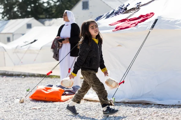 Refugees  living in tents in the center relocation Diavata — Zdjęcie stockowe