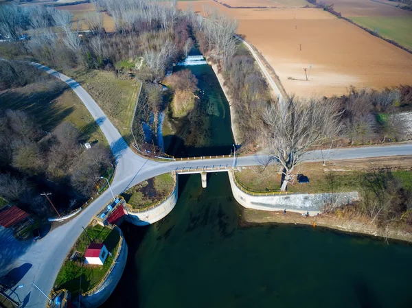 Aerial view of the bridge and the road over the river Aggitis an — Stock Photo, Image