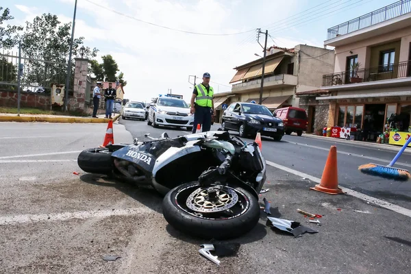 Traffic accident between a car and a motorcycle — Stock Photo, Image